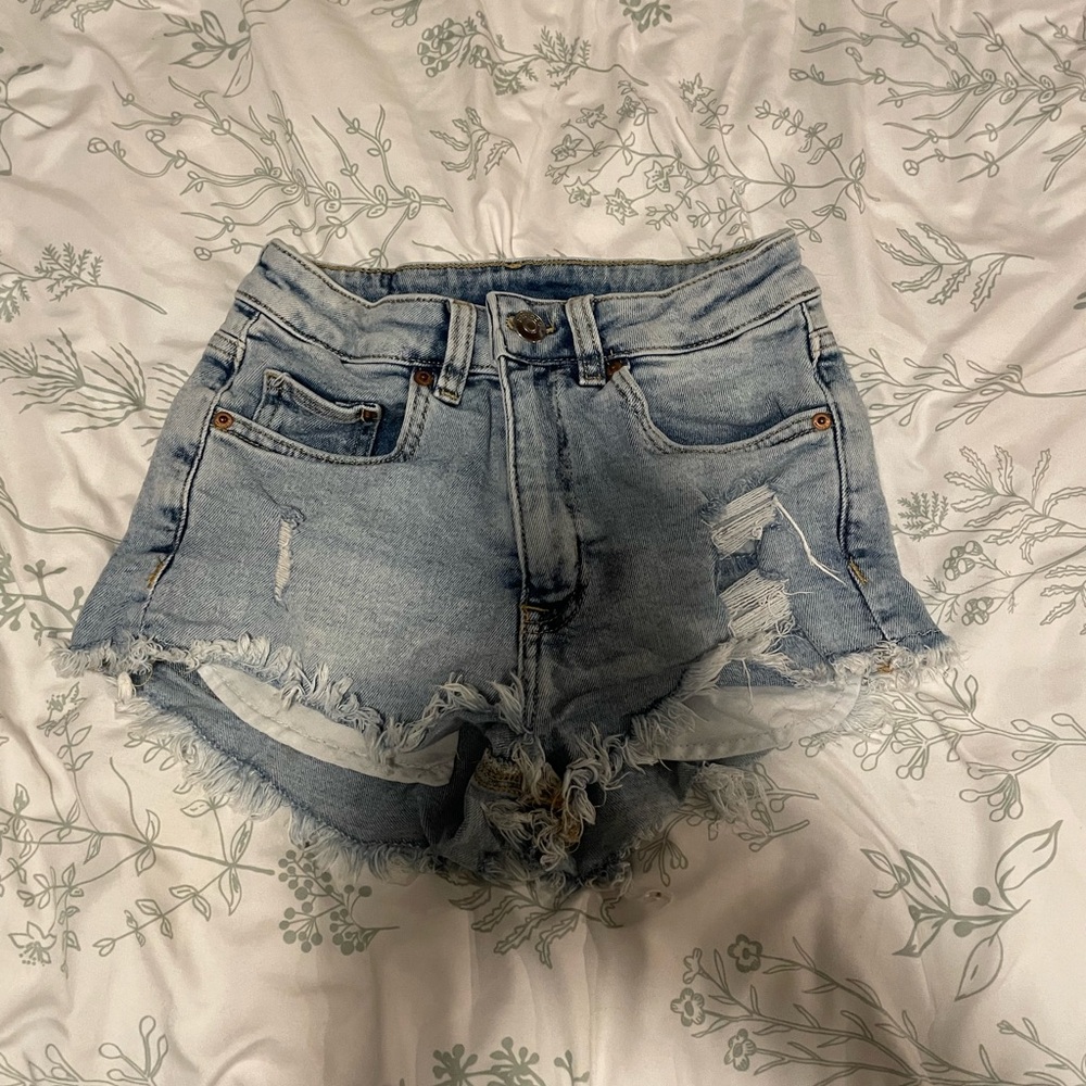 Divided Light Blue Distressed Jean Shorts
